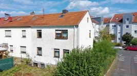 Hauptbild Attraktives Reihenendhaus mit Potenzial in begehrter Nilkheimer Lage - Garten - Sanierungsbedarf